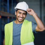 Trust me, Im an engineer. Portrait of a confident young man working a construction site.