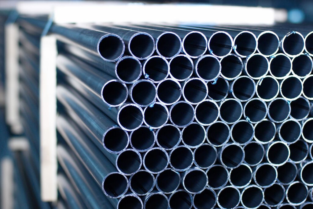 Steel Pipes bunch on the rack in warehouse